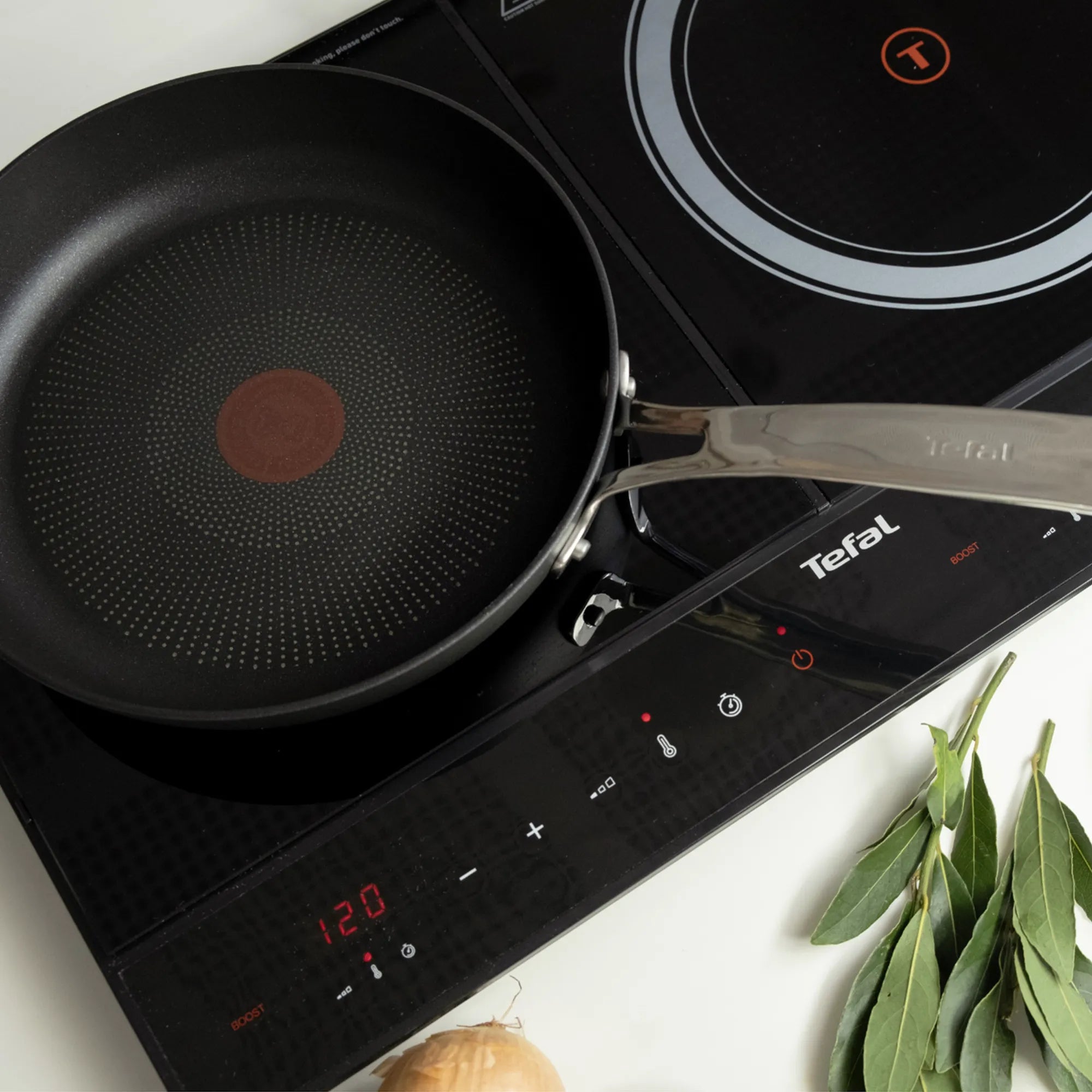 Tefal Dual Express Induction Hob IH9038 in use with pan