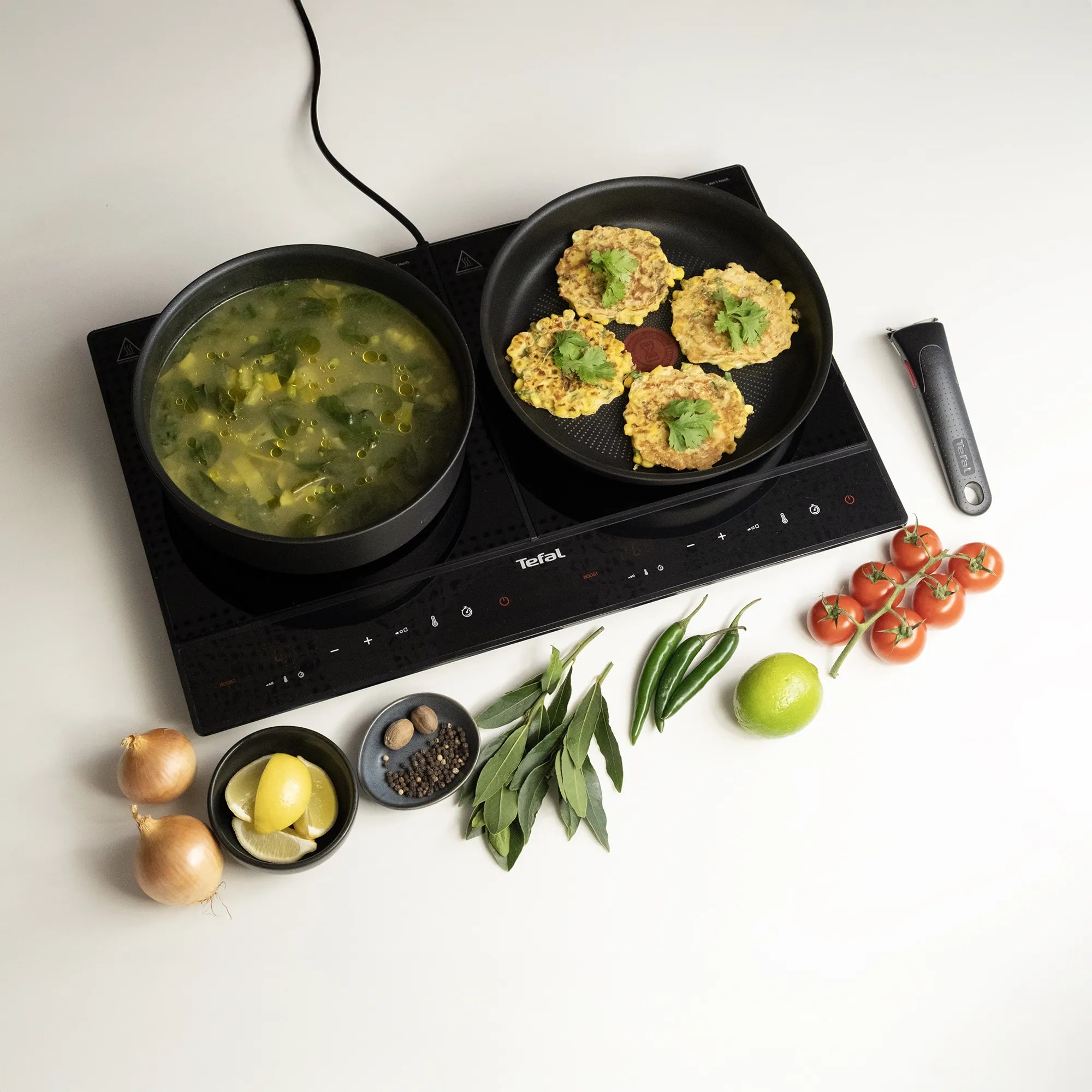Tefal Dual Express Induction Hob IH9038 in use cooking food