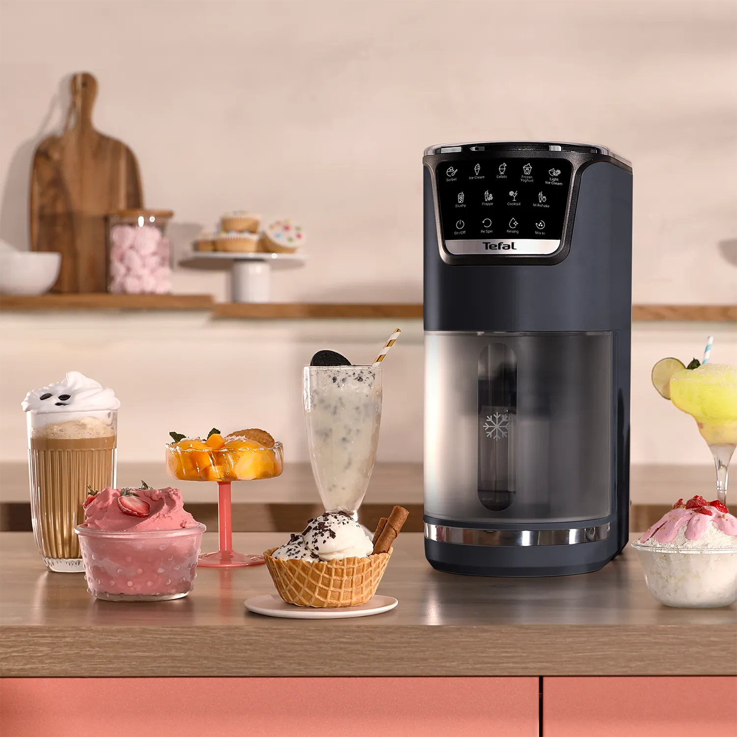 Tefal Dolci Black Knight Ice Cream Maker with various ice creams and frappe