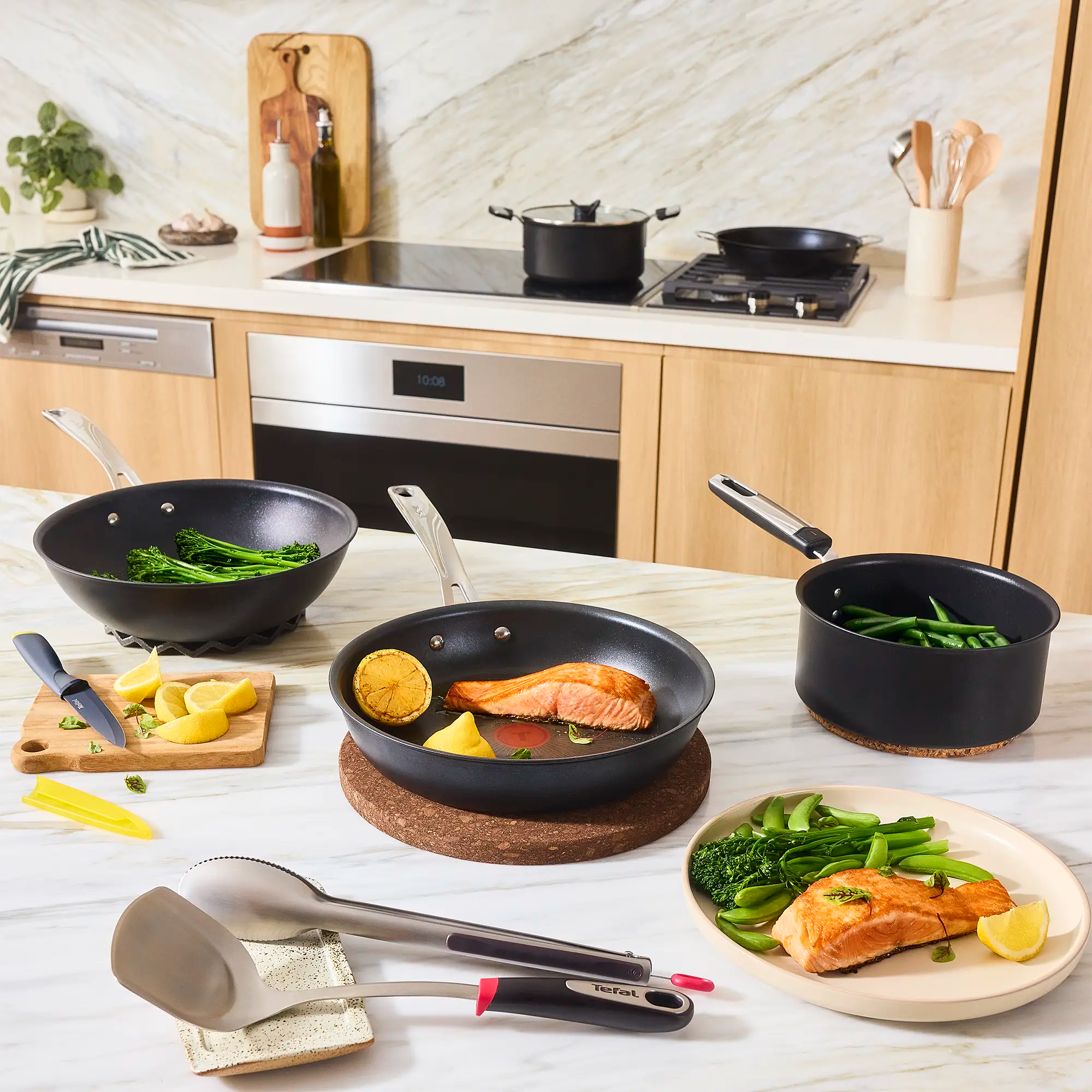 Tefal Excellence+ Induction FusionCore Non-Stick Frypan and wokj on kitchen bench