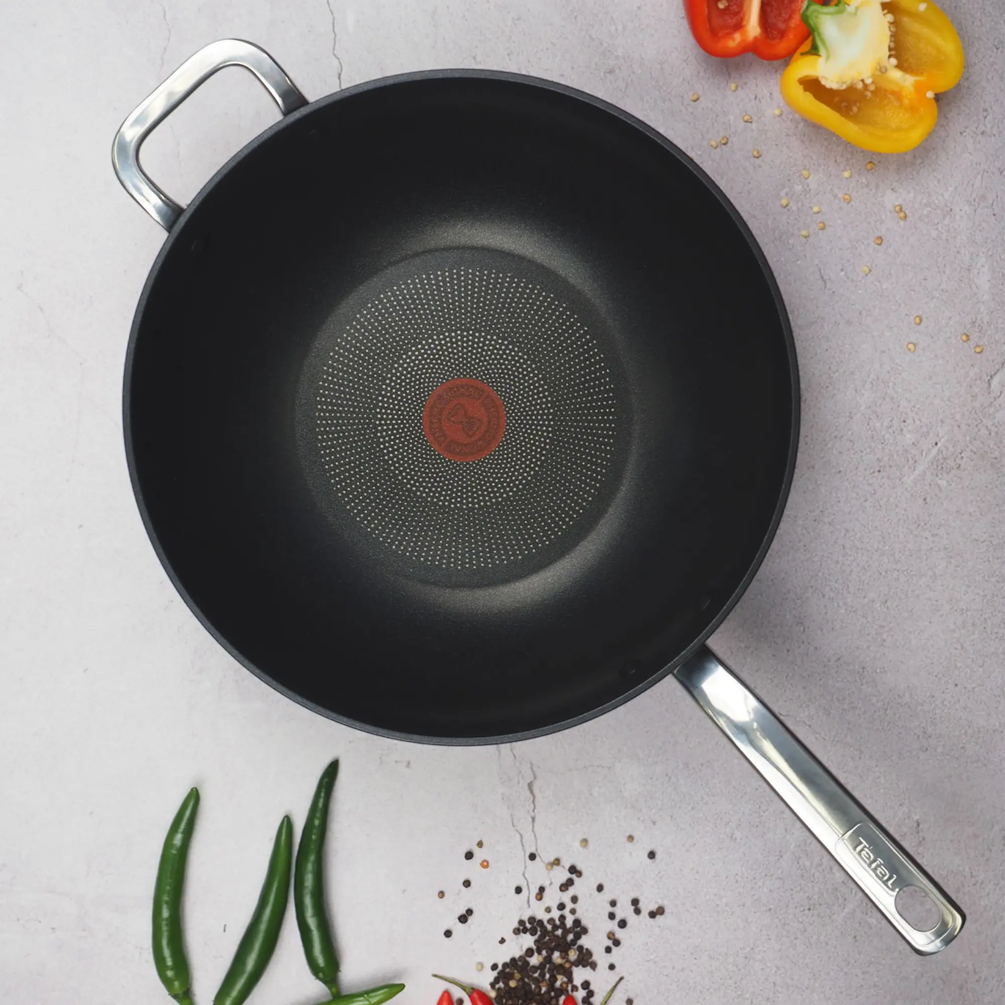 Tefal Premium Specialty Hard Anodised Induction Non-Stick Wok 32cm + Lid on kitchen bench