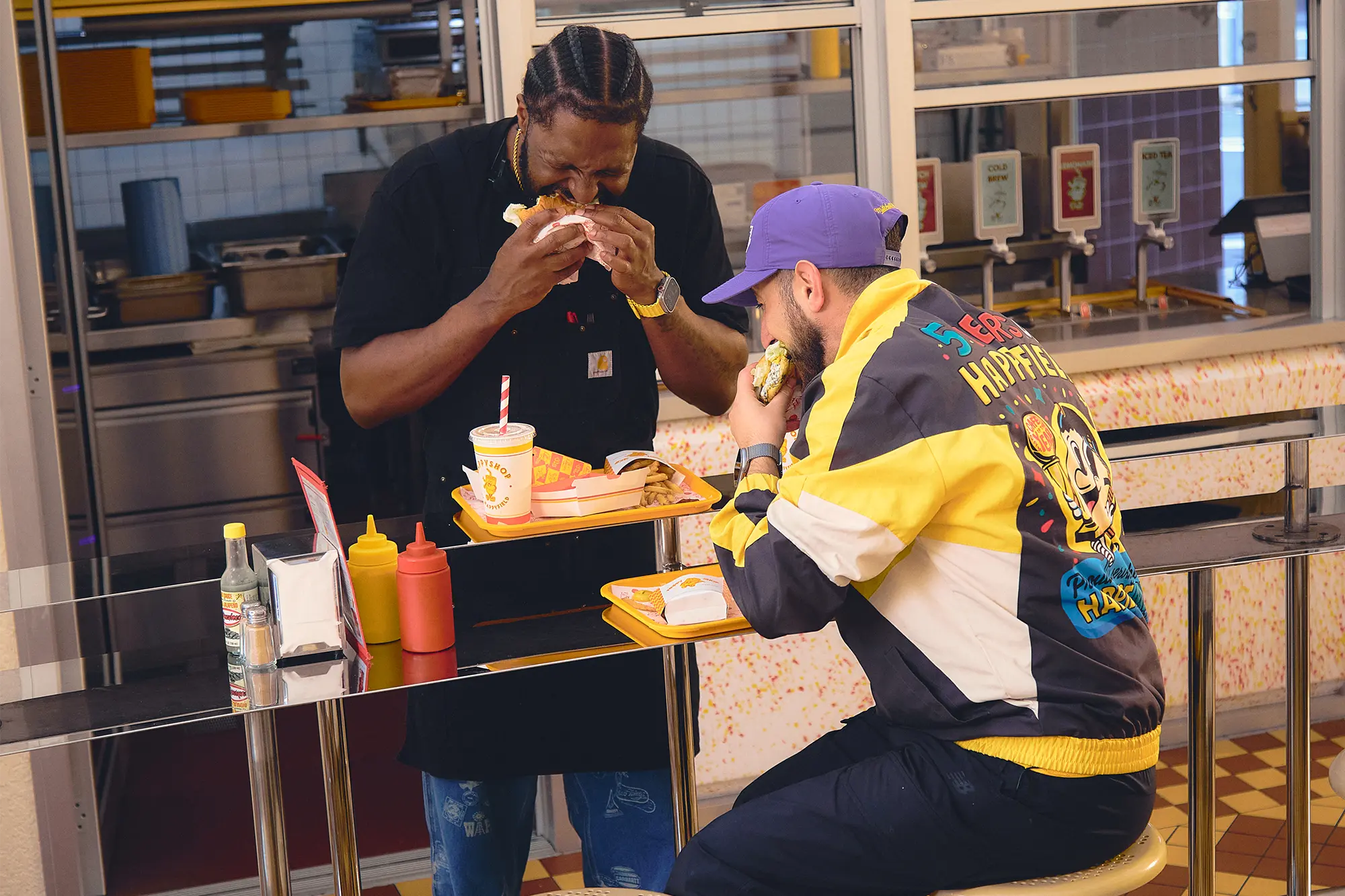 Chris Theodosi & Jesse Orleans from Happyfield enjoying smash burger