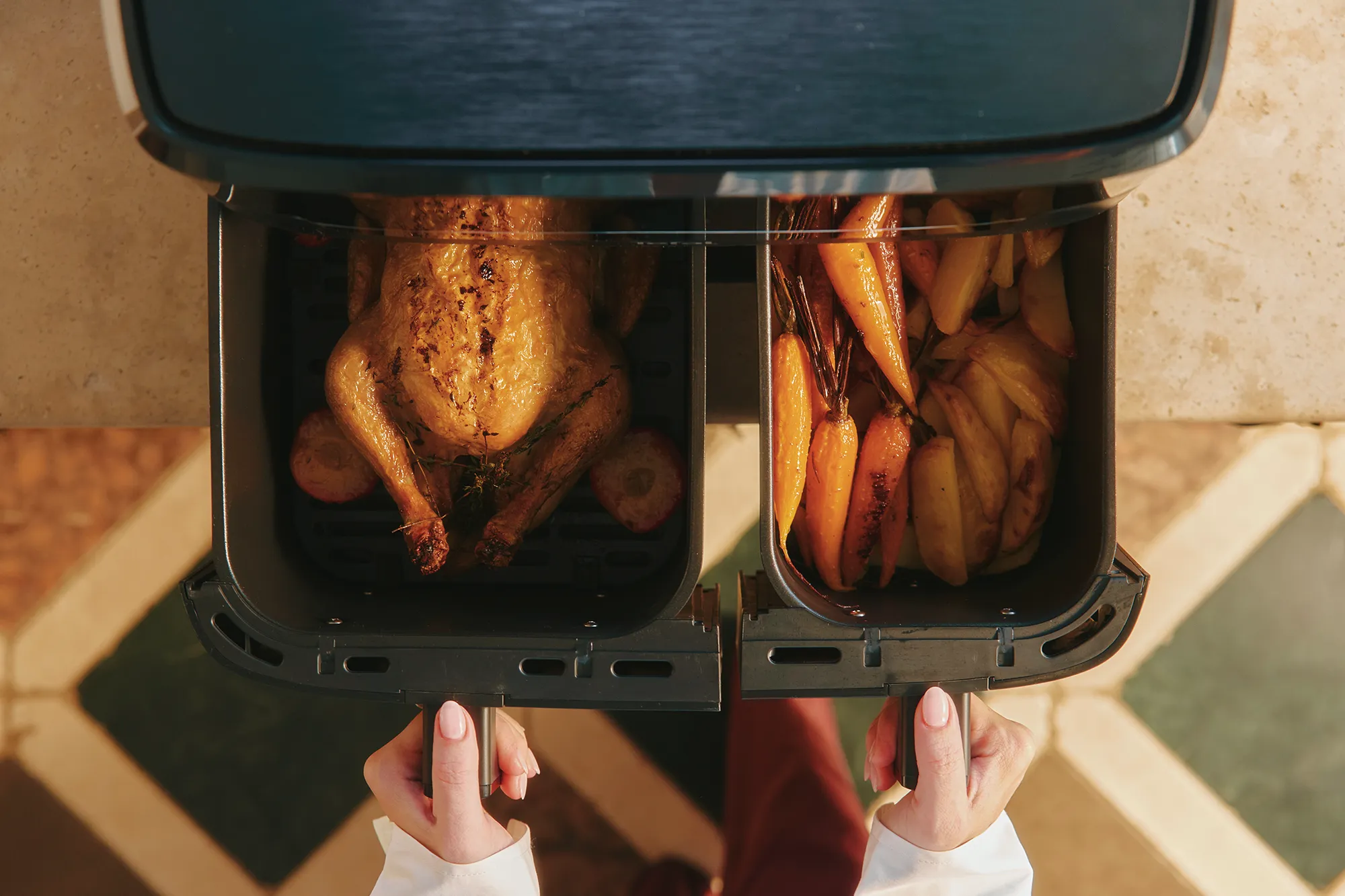 Tefal EY9458 Dual Easy Fry & Grill cooking two meals at once